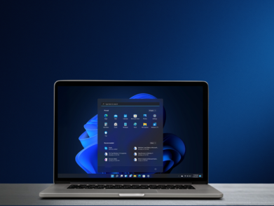  A laptop displaying the Windows 11 Start menu on its screen.